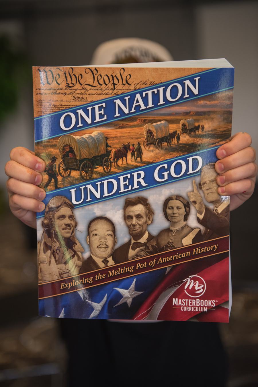Student holding One Nation Under God